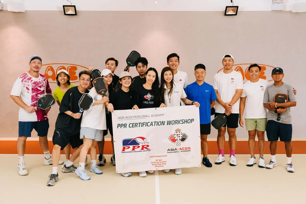Coaches with the PPR certification workshop banner